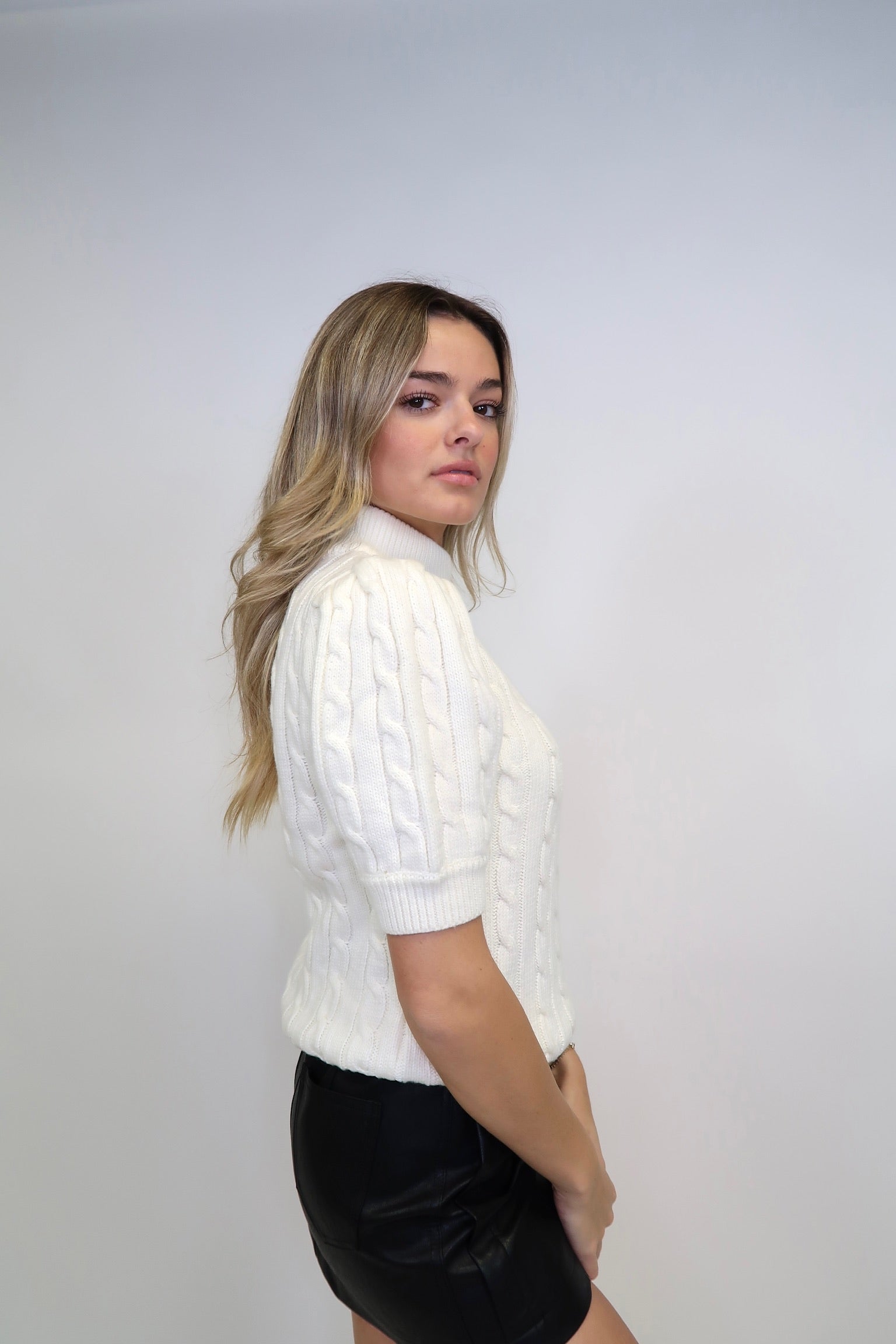 THE CABLE KNIT SWEATER