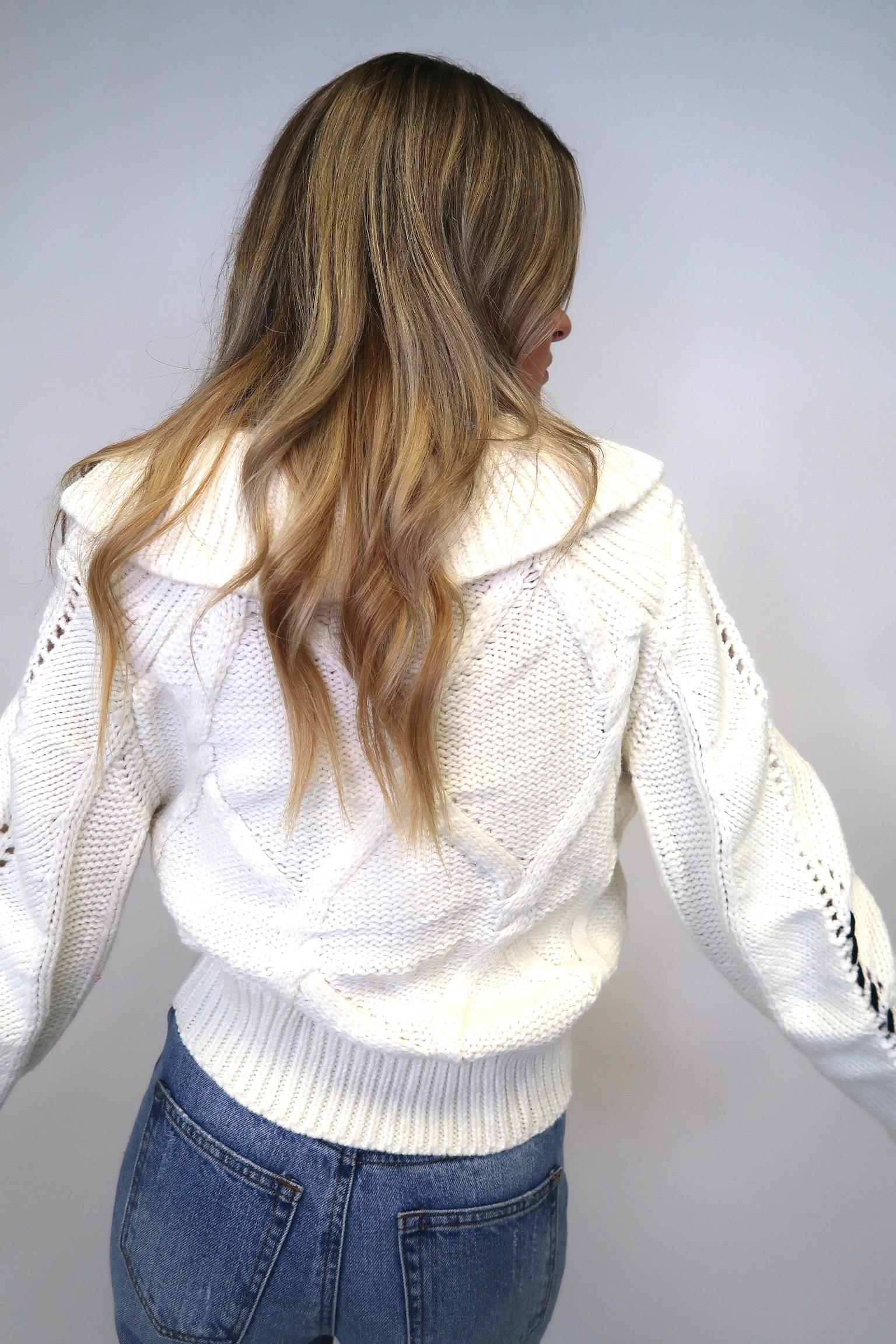 ALL STITCHED UP SWEATER