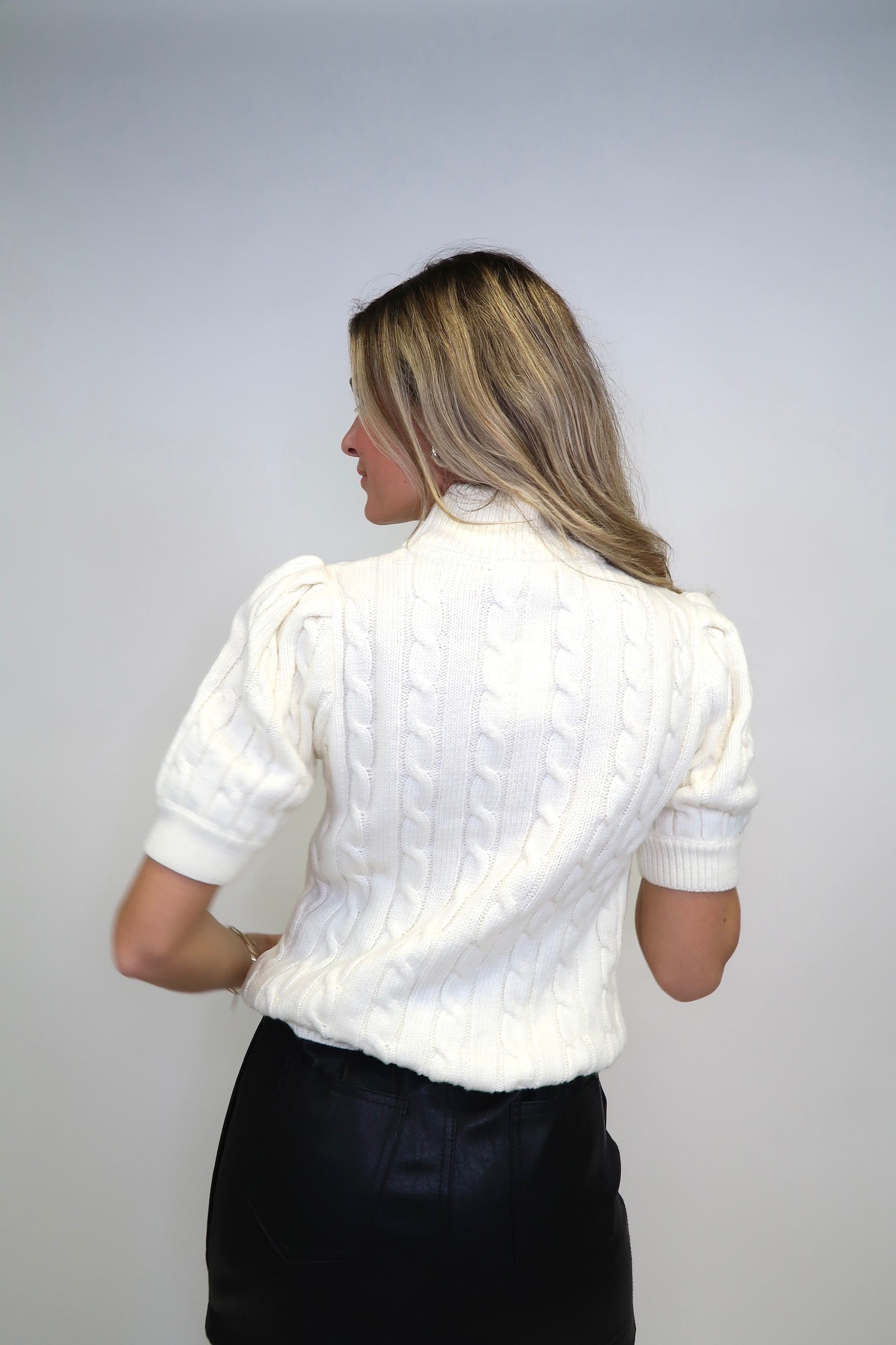 THE CABLE KNIT SWEATER