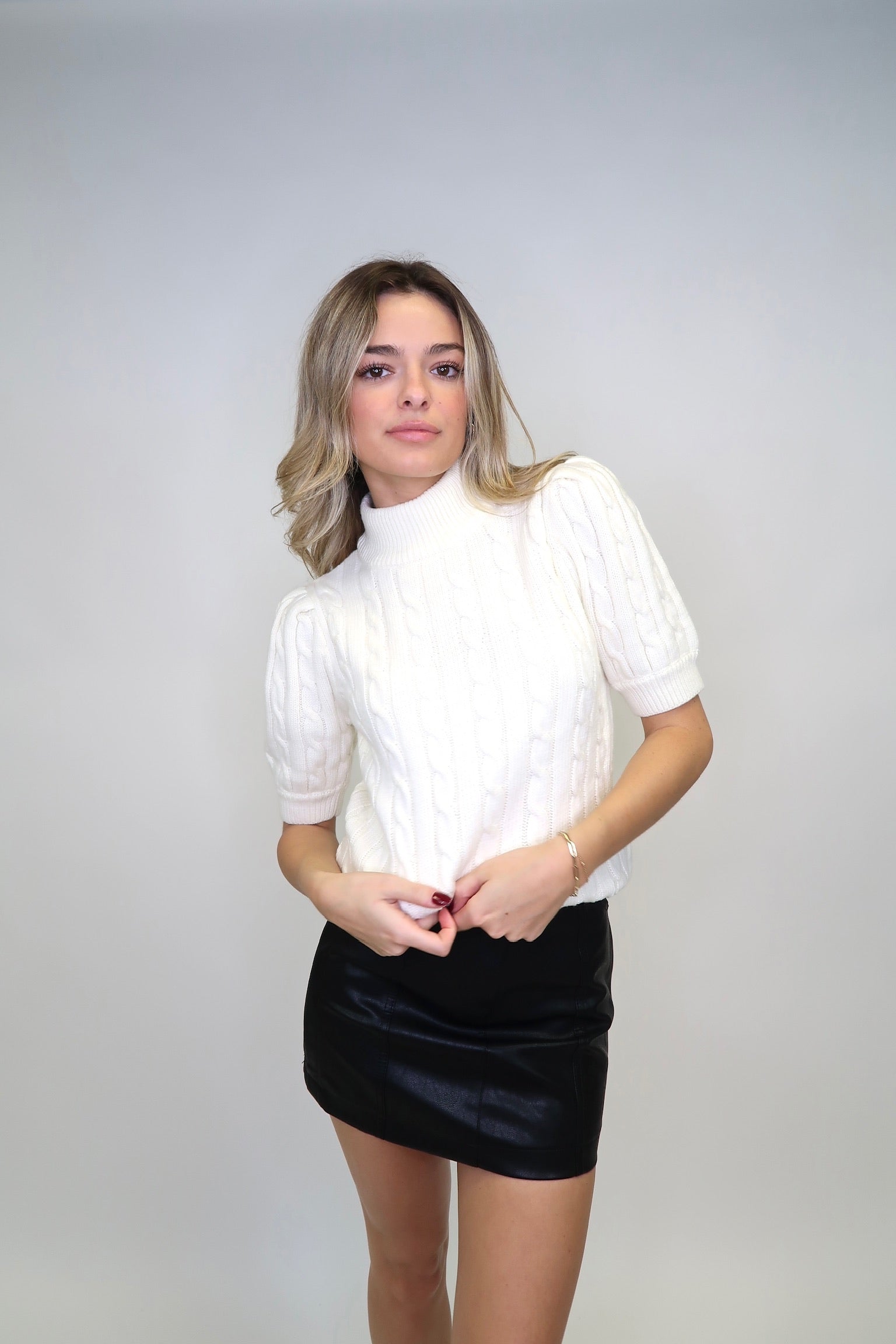 THE CABLE KNIT SWEATER
