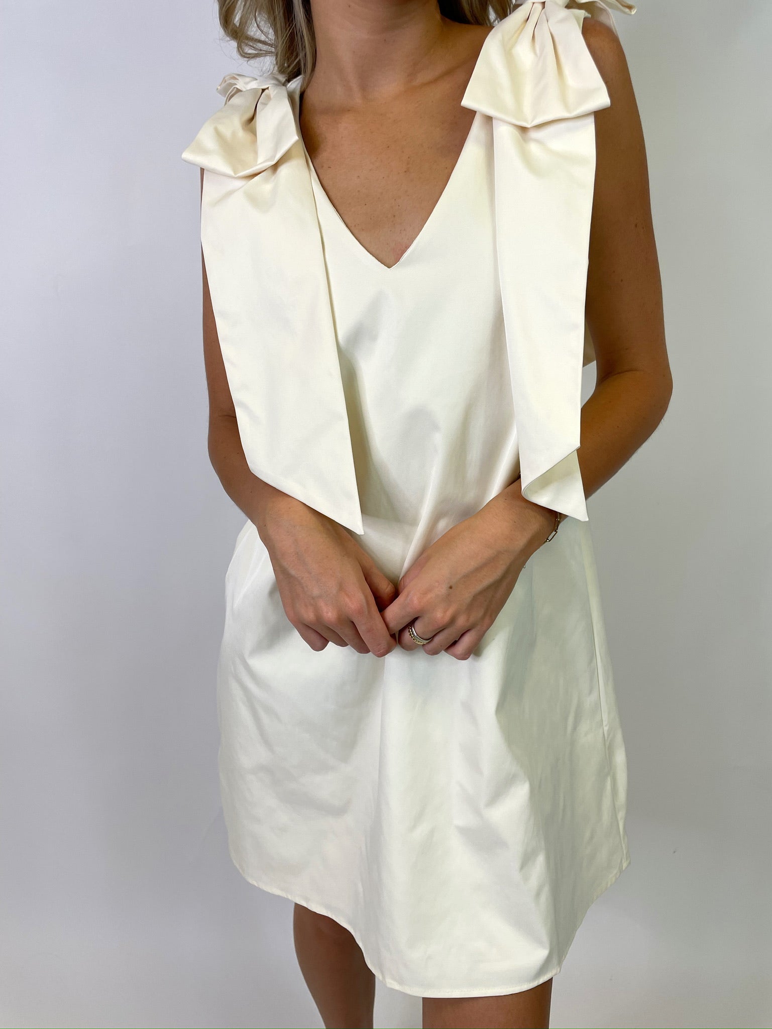 THE BRIGETTE BOW DRESS