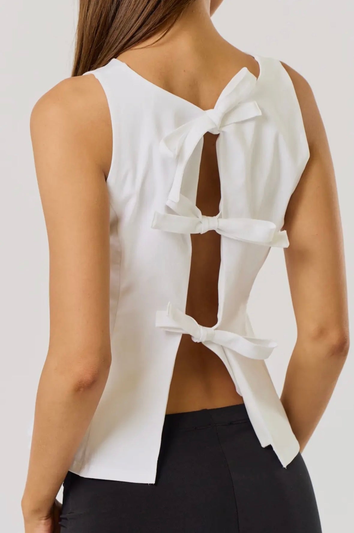 CRESCENT PEPLUM TOP